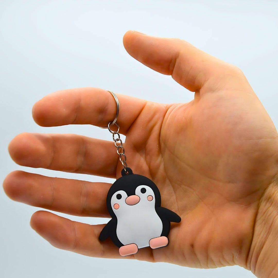 Pinguin Anhänger in menschlicher Hand